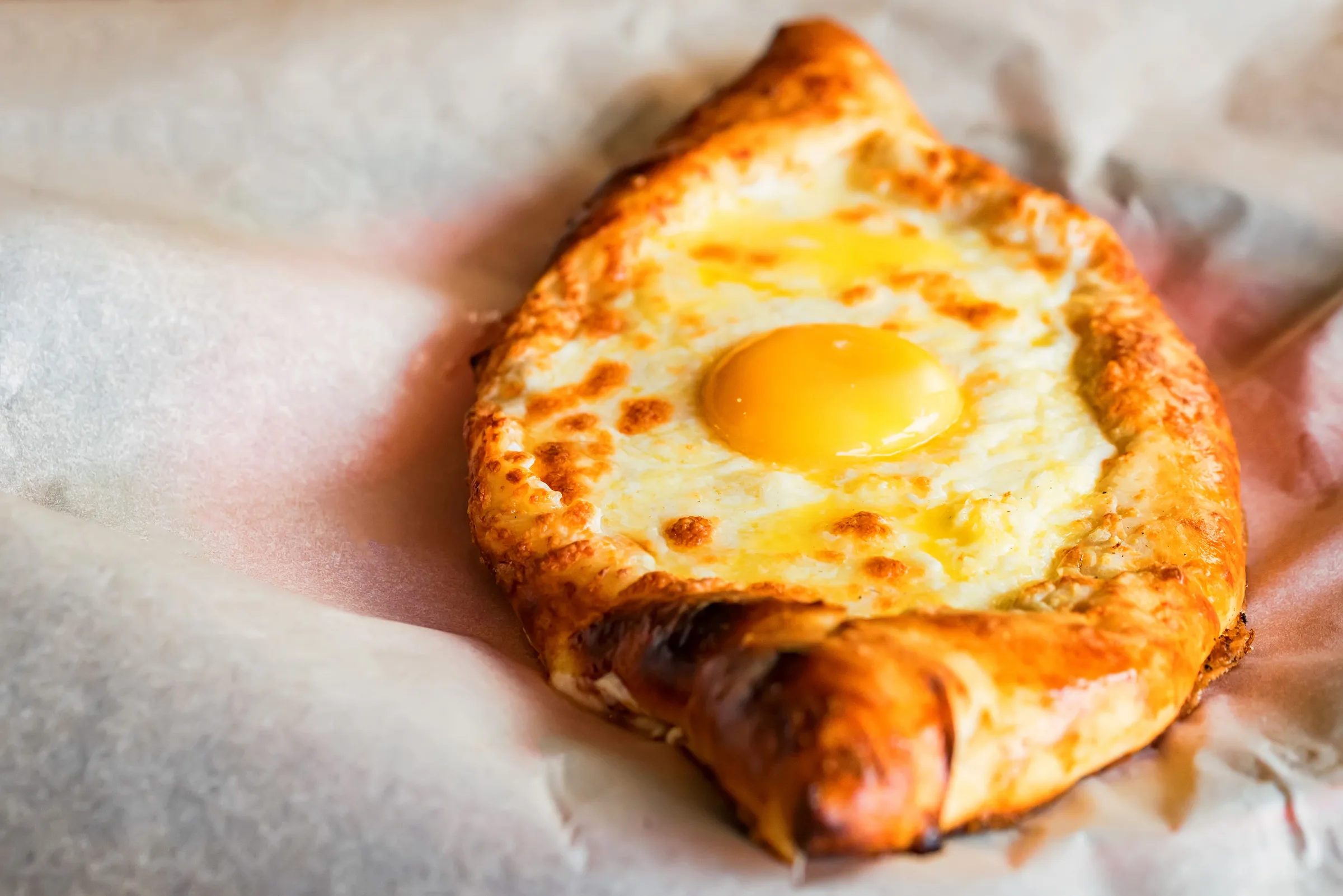 Adjarian khachapuri with egg and butter